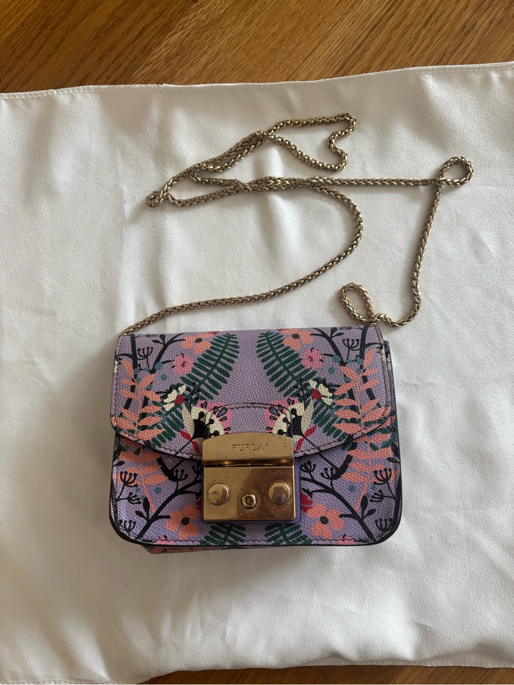 Furla Metropolis Mini Crossbody in a printed botanical/floral leather
